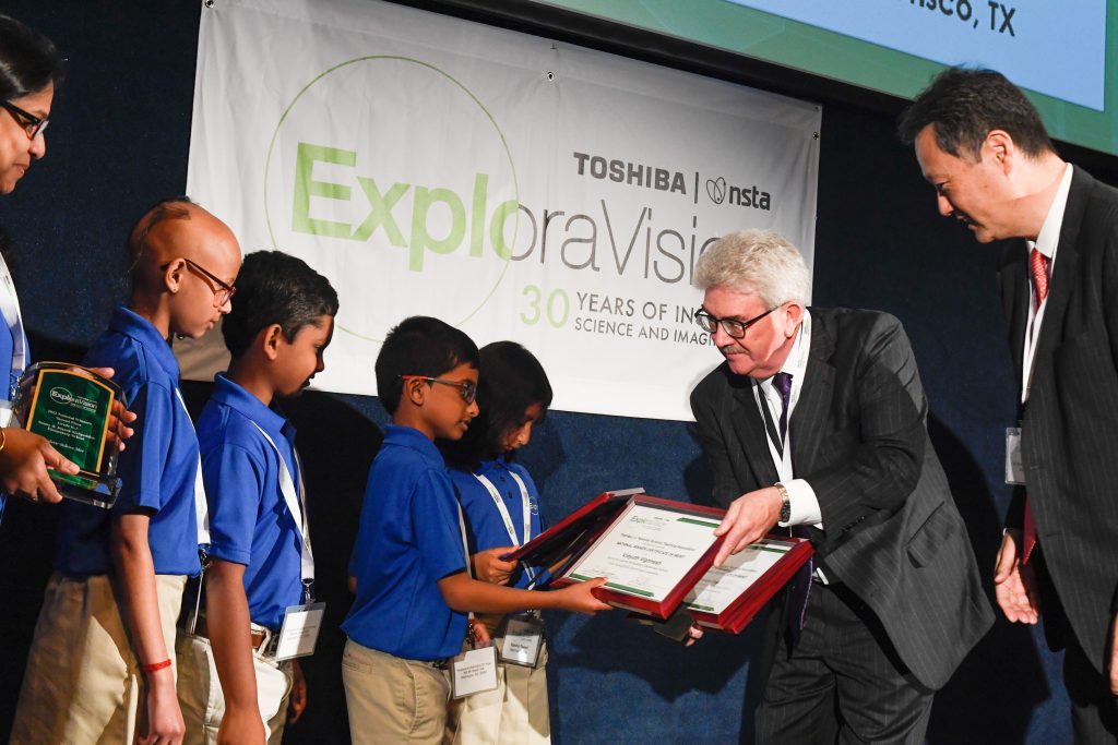 ExploraVision Winners Receiving a certificate