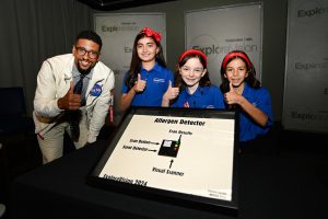 Justin Mr. Fascinate Sheifer and third-grade students Emilia Martinez-Christensen, Isabella Gustin, Adriana Icaza. Photo credit to JAX Photography.