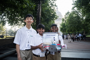 Aarnavi Ghorai, Kyle Li, Srinithik Sabry, and Coach Nicole McRee from Twin Groves Middle School in Buffalo Grove, Illinois.