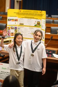 Image of 2 fifth grade students at Electro-BUZZ event.